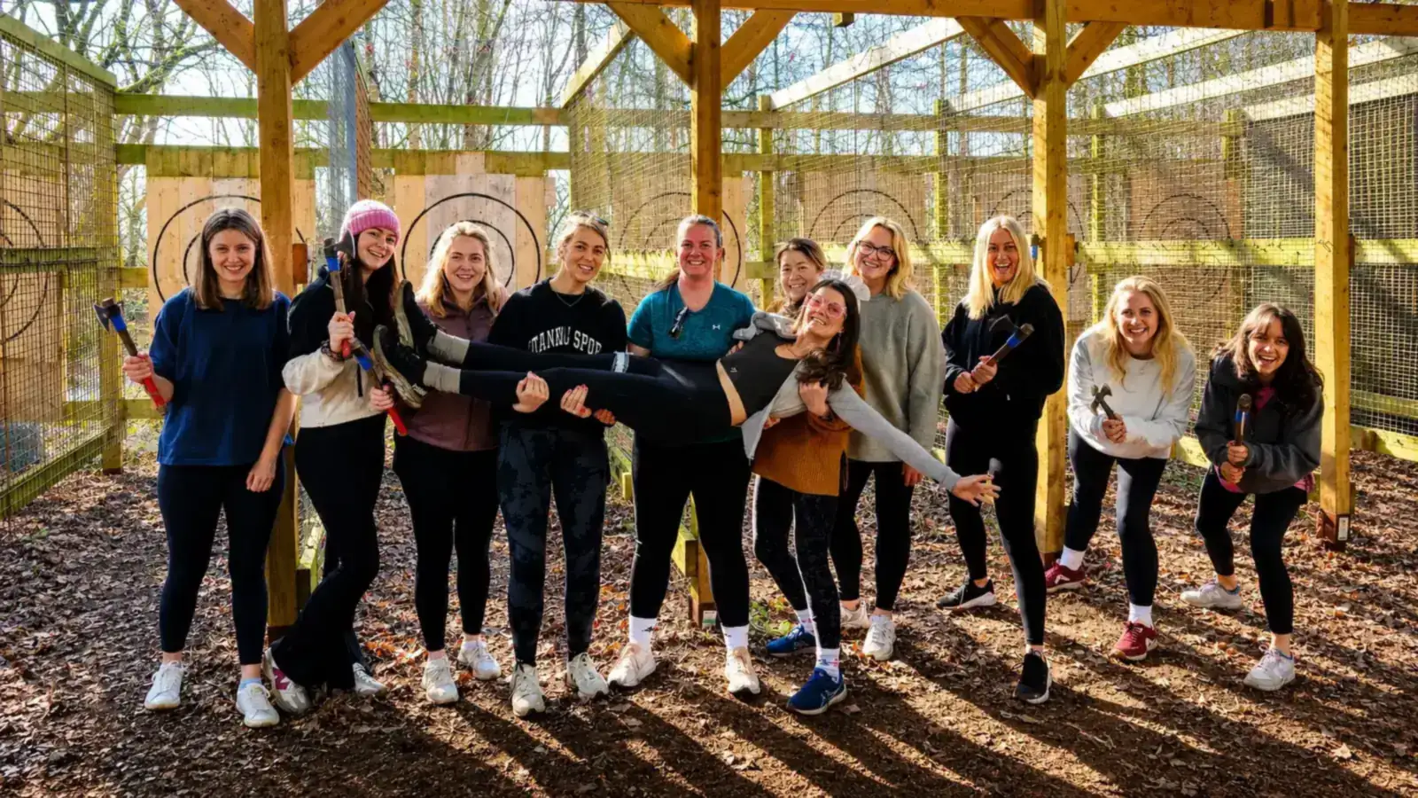 A hen party at the axe throwing range